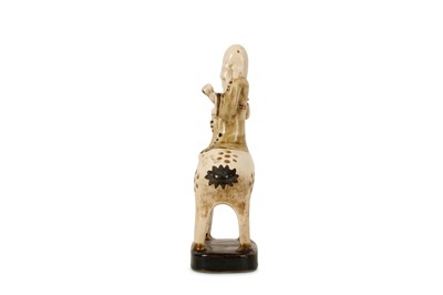 Lot 39 - A CHINESE POTTERY FIGURE OF SHOULAO ON A DEER.