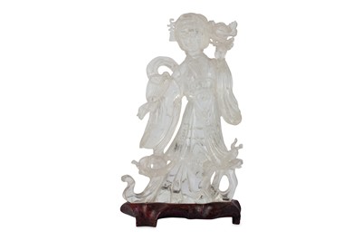 Lot 103 - A CHINESE ROCK CRYSTAL CARVING OF AN IMMORTAL...
