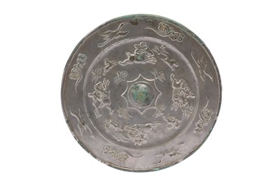 Lot 704 - A CHINESE BRONZE SILVERED MIRROR.