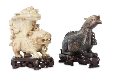 Lot 155 - TWO CHINESE CHICKEN BONE JADE 'MYTHICAL BEAST' CARVINGS.