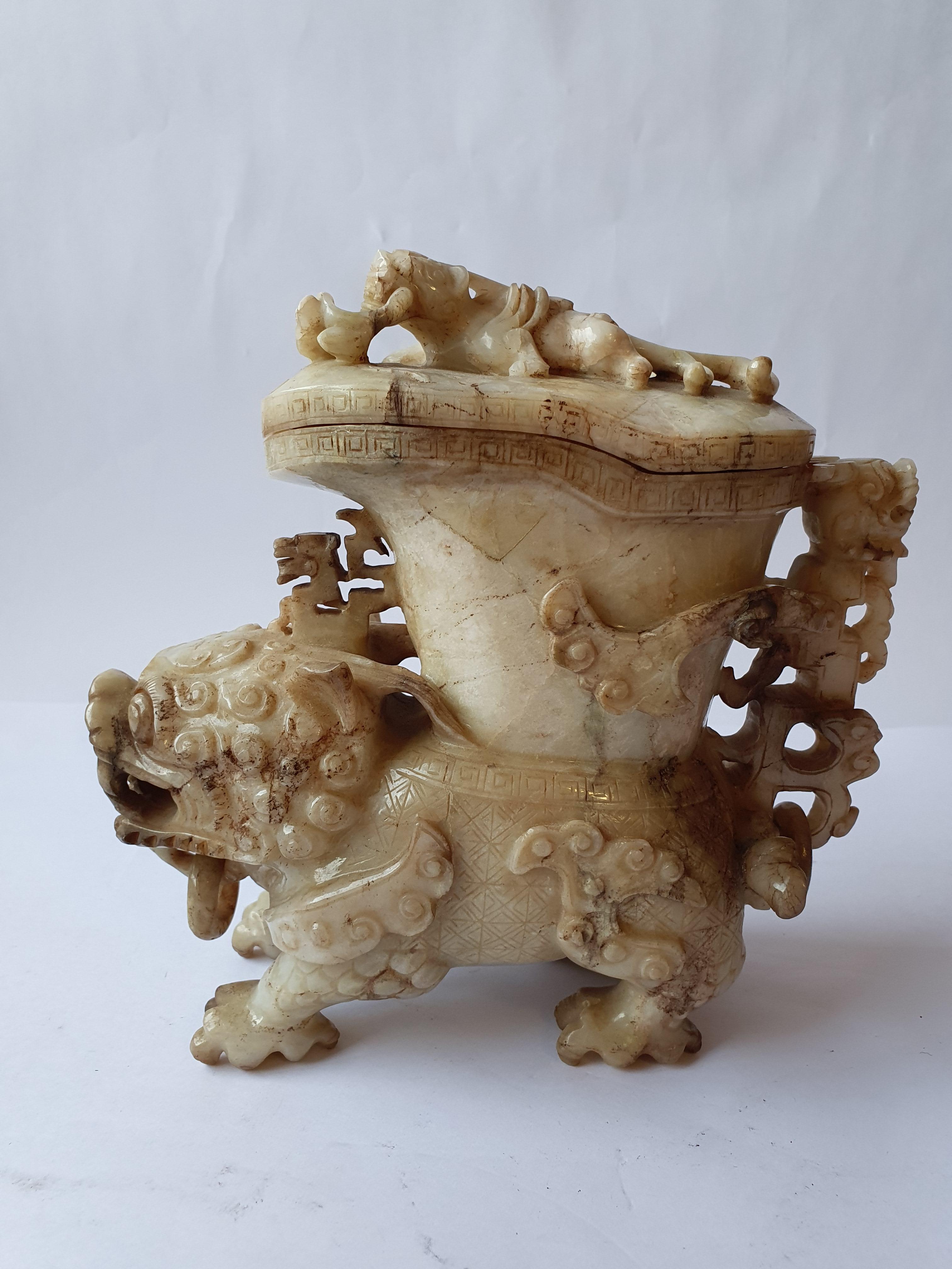 Lot 711 - TWO CHINESE CHICKEN BONE JADE 'MYTHICAL