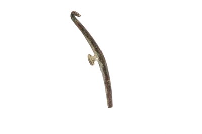 Lot 699 - A CHINESE SILVER-INLAID BRONZE GARMENT HOOK.
