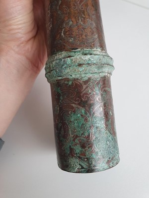 Lot 350 - A CHINESE SILVER-INLAID BRONZE CHARIOT CANOPY FITTING.