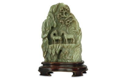 Lot 221 - A CHINESE PALE CELADON JADE CARVING OF A...