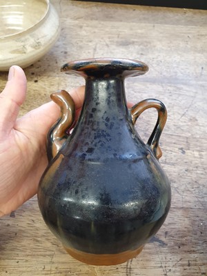Lot 35 - A CHINESE BLACK AND BROWN-SPLASHED EWER.