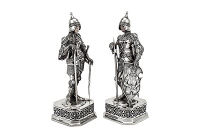 Lot 249 - A pair of early 20th century German 935 standard silver and ivory figural ornaments, import marks for London 1927 by T C & Son Ltd, probably Thomas Callow & Son’s