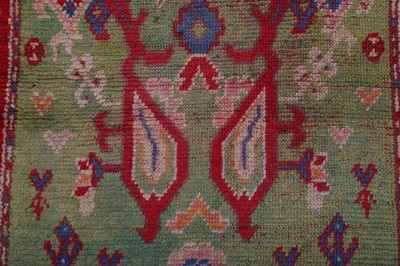 Lot 1 - AN ANTIQUE USHAK RUG, TURKEY approx: 5ft.9in....