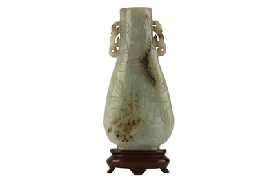 Lot 292 - A CHINESE JADE PEAR-SHAPED VASE. The flattened...