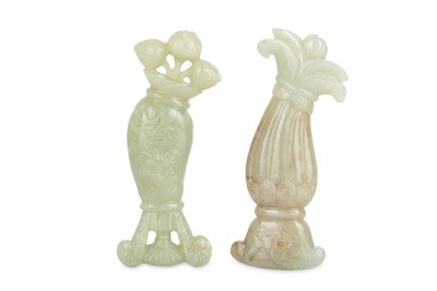 Lot 507 - TWO CHINESE PALE CELADON JADE DAGGER HANDLES....