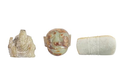 Lot 483 - TWO CHINESE PALE CELADON JADE CARVINGS. / A CHINESE PALE CELADON JADE ARCHAISTIC BLADE.