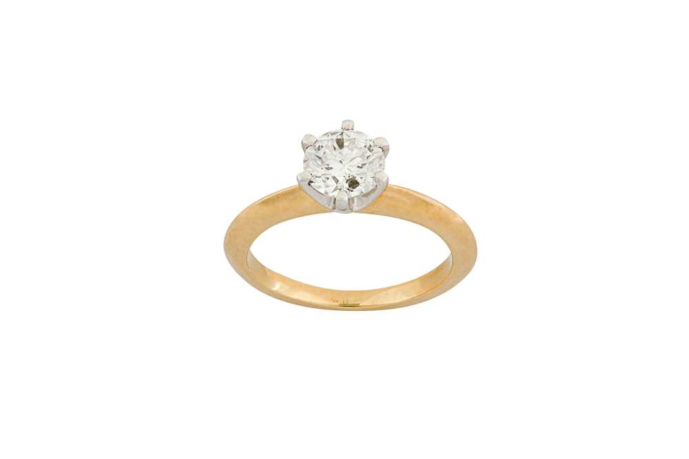 Lot 36 - A diamond single-stone ring The claw-set...