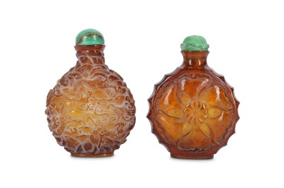 Lot 484 - TWO CHINESE BROWN GLASS SNUFF BOTTLES.