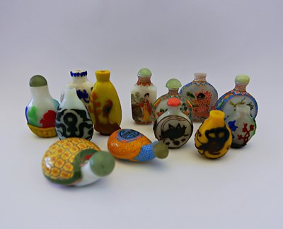 Lot 474 - A COLLECTION OF THIRTEEN CHINESE ENAMELLED AND PEKING GLASS SNUFF BOTTLES