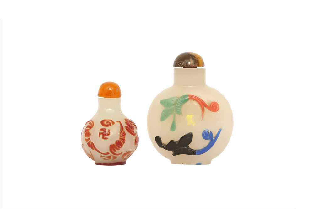 Lot 196 - TWO CHINESE OVERLAY GLASS SNUFF BOTTLES.