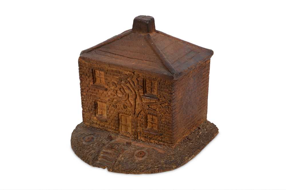 Lot 348 - A 19/20th century stoneware money box in the form of a cottage