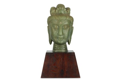 Lot 223 - A CHINESE PALE CELADON JADE HEAD OF GUANYIN. ...