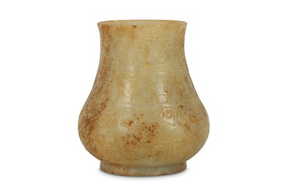 Lot 217 - A SMALL CHINESE CREAM JADE ARCHAISTIC VASE.