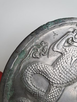 Lot 995 - A CHINESE BRONZE MIRROR.