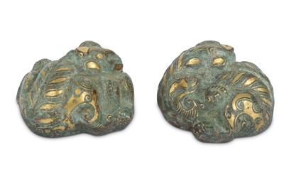 Lot 322 - A PAIR OF CHINESE BRONZE GOLD-INLAID TIGERS.