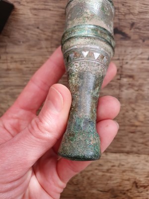 Lot 708 - A CHINESE BRONZE FERRULE.