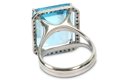Lot 193 - A blue topaz and diamond ring, the...