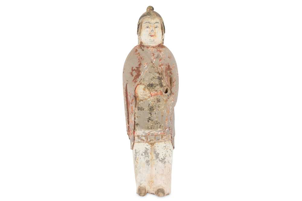 Lot 307 - A CHINESE POTTERY FIGURE OF AN OFFICIAL.