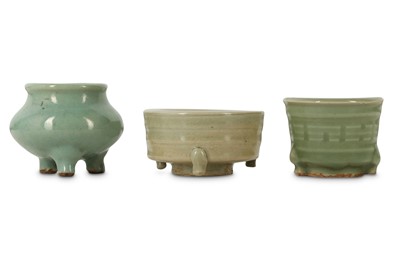 Lot 578 - THREE CHINESE LONGQUAN CELADON TRIPOD INCENSE BURNERS.