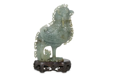 Lot 565 - A CHINESE GREY JADE ARCHAISTIC 'PHOENIX' VESSEL AND COVER.