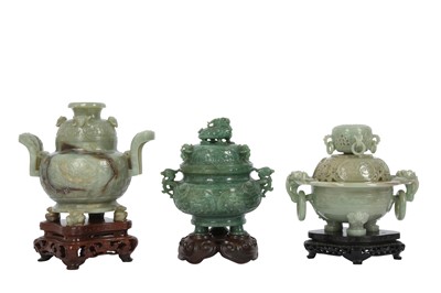 Lot 598 - THREE CHINESE GREEN HARDSTONE INCENSE BURNERS AND COVERS.