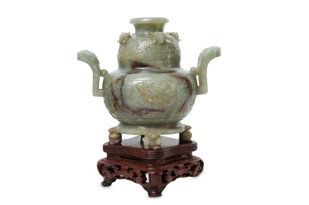 Lot 79 - A CHINESE PALE CELADON JADE INCENSE BURNER AND COVER.