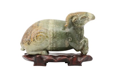 Lot 637 - A CHINESE PALE CELADON JADE ARCHAISTIC MODEL OF A RAM.