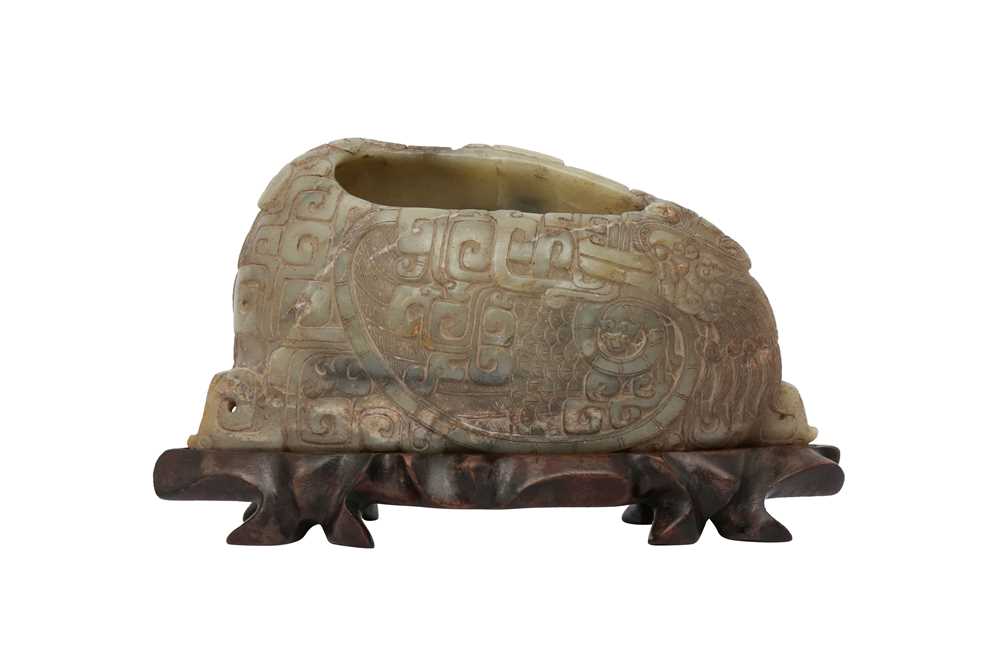 Lot 572 - A CHINESE PALE CELADON JADE ARCHAISTIC 'DUCK' BRUSH WASHER.