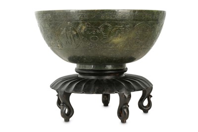 Lot 287 - A large Chinese spinach jade 'longevity' bowl.