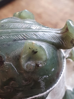 Lot 82 - TWO CHINESE SPINACH GREEN JADE 'BIRD' VESSELS AND COVERS.