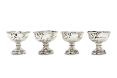 Lot 16 - A set of four George III sterling silver salts,...