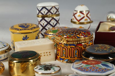 Lot 147 - A quantity of porcelain trinket boxes many by...