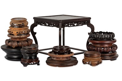 Lot 484 - A GROUP OF CHINESE AND JAPANESE WOOD STANDS....