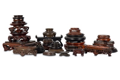 Lot 486 - A GROUP OF CHINESE WOOD STANDS. various sizes....