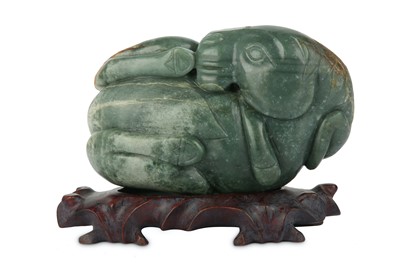 Lot 181 - A CHINESE CELADON JADE CARVING OF A HORSE.