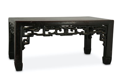 Lot 451 - A CHINESE LOW WOOD TABLE. Qing Dynasty. The...