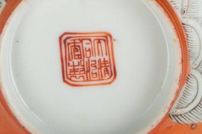 Lot 140 - A CHINESE FAMILLE ROSE ORANGE-GROUND...
