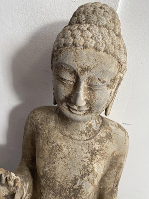 Lot 822 - A CHINESE STONE CARVING OF A STANDING BUDDHA