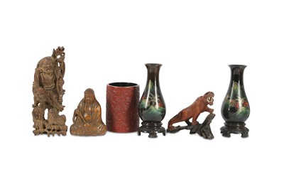 Lot 240 - A collection of Chinese wood carvings.