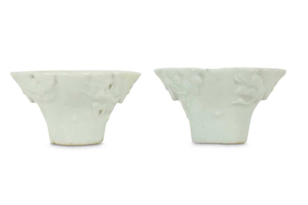 Lot 309 - A PAIR OF CHINESE MINIATURE BLANC-DE-CHINE LIBATION CUPS.