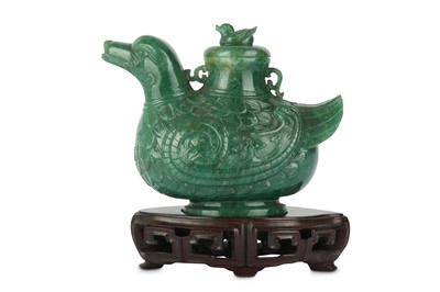 Lot 322 - A Chinese green hardstone 'duck' archaistic vessel and cover, zun.