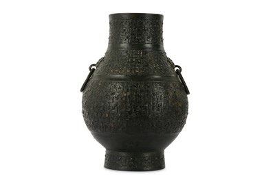 Lot 243 - A CHINESE ARCHAISTIC BRONZE VASE, HU. Ming...