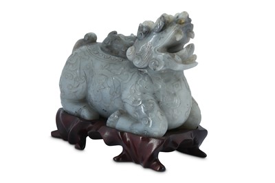 Lot 183 - A CHINESE GREY JADE CARVING OF A QILIN.