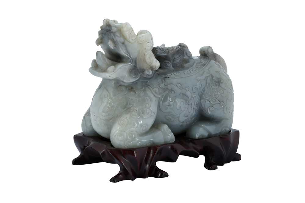 Lot 183 - A CHINESE GREY JADE CARVING OF A QILIN.