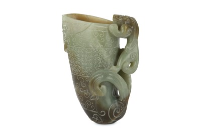 Lot 332 - A CHINESE PALE CELADON JADE ARCHAISTIC 'DRAGON'...