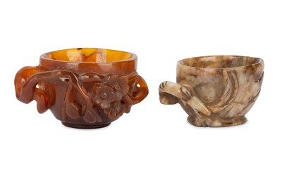 Lot 141 - TWO SMALL CHINESE HARDSTONE CUPS. The first...